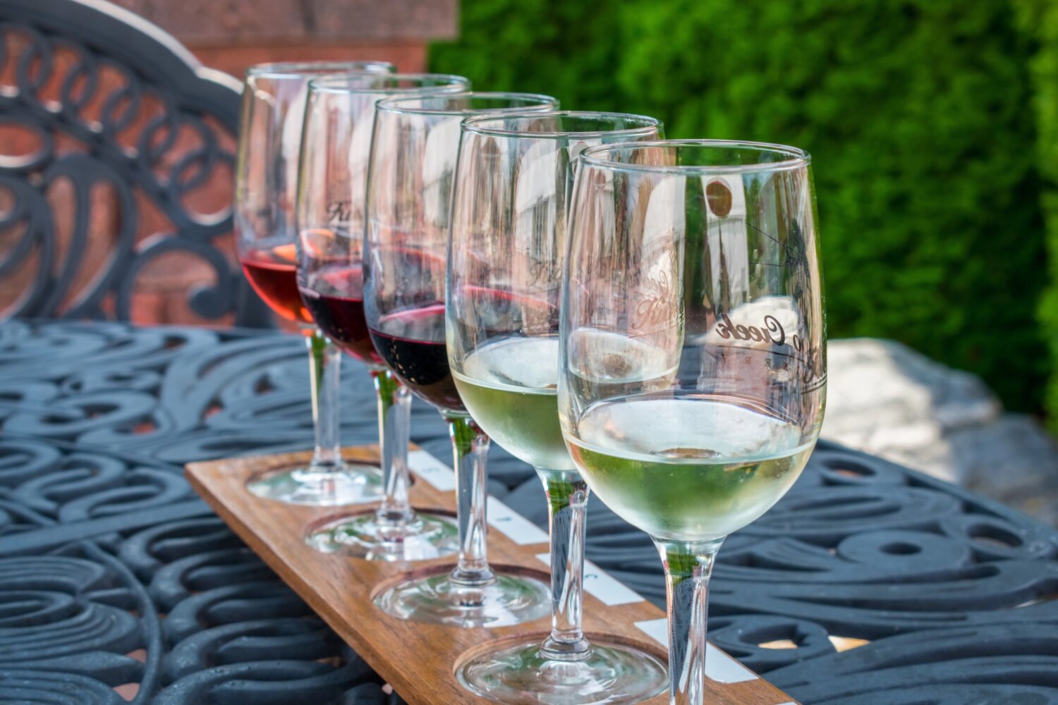 Wine flight on an outdoor table at a winery
